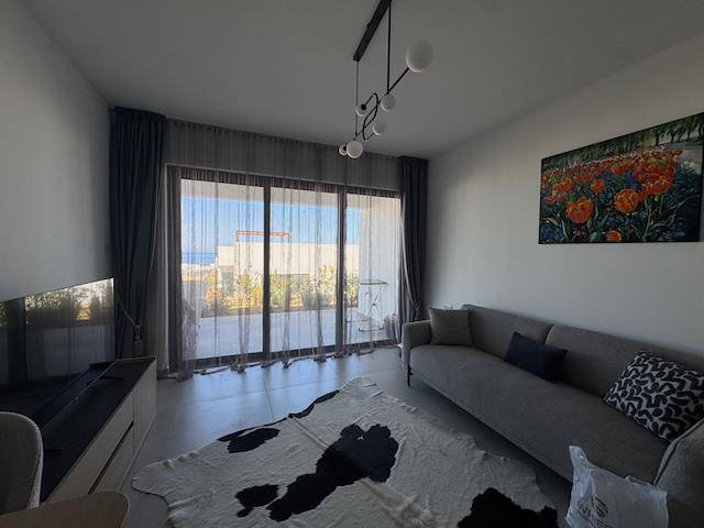 Great Location! First Coastline! 200M To The Sea! Ready Fully Furnished 2+1 Apartment In “Deja Blue” Premium Residence On The Ground Floor. 85 m² Area + 43 m² Terrace and Garden All Taxes Paid!