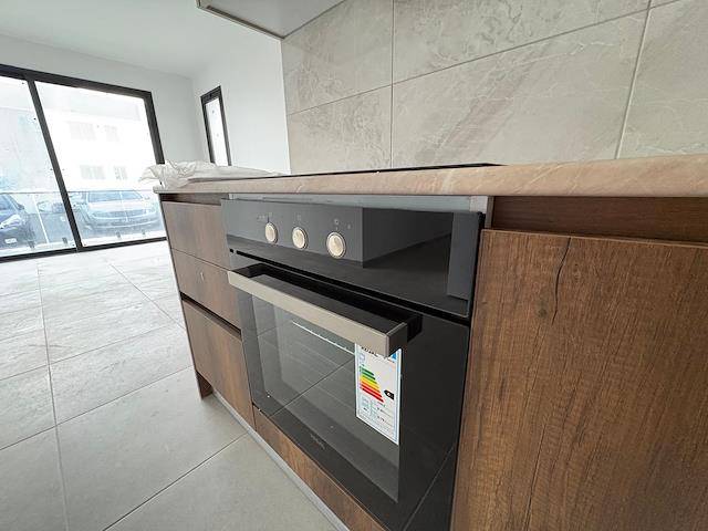 Girne Karanoglanoglu Sanayi Bölgesine Yürüme Mesafede Kiralık Sifir 2+1 Daire 700 Stg /