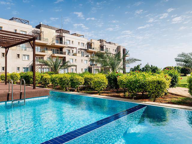 1+1 Apartment With Garden For Sale In Iskele Bafra Area, Turkish Title Deed
