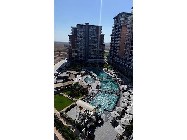 İskele Long Beach Bölgesinde Riverside Life Residence Sitesinde Satılık Masrafsız Beyaz Eşyalı 1+1 Daire