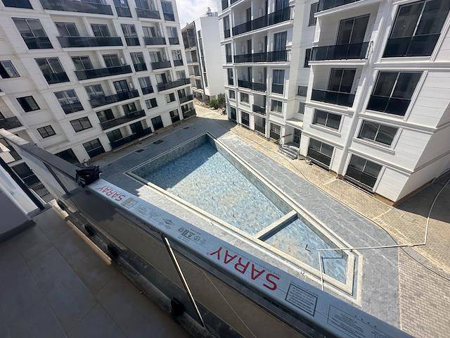 Gazimağusa Merkezde Havuzlu Site İçersinde Satılık 2+1 Daire